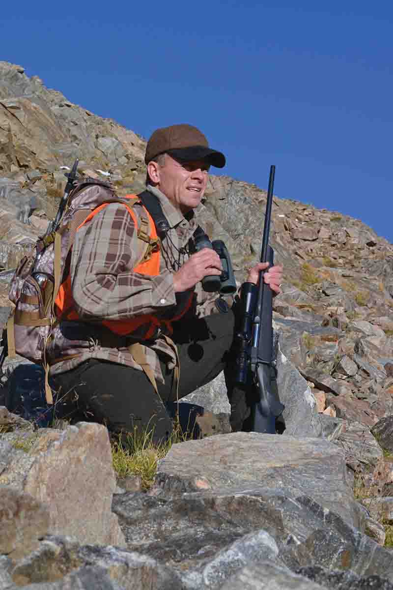 Jack is shown glassing from a scree slope at 10,000 feet. Muleys can be found at very high elevations in early autumn.